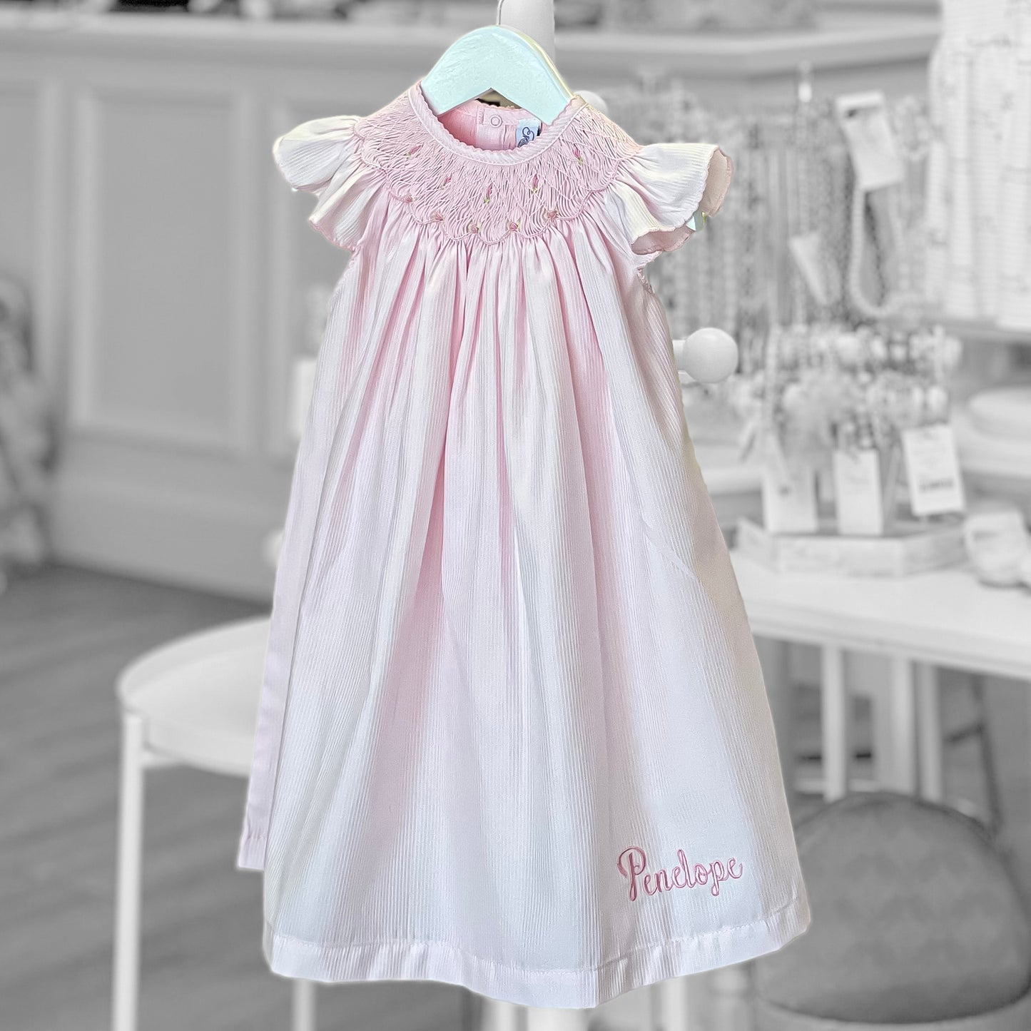 Light Pink Flutter Sleeve Smocked Dress